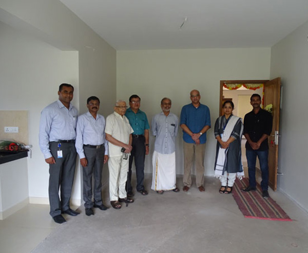 Our team with Mr. Unnikrishnan & family of apartment B 5 in Crescent Aster after handing over.