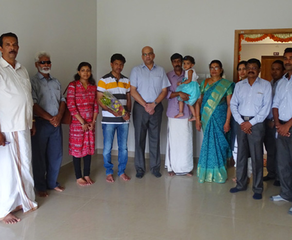 Our team with Mr. Amal Kumar & family of apartment B 7 in Crescent Aster after handing over.