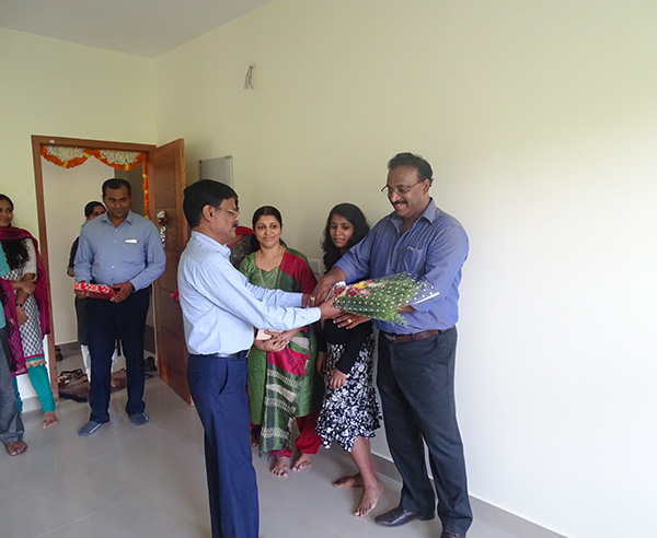 Our G M Projects greeting Mr.Perumthodi Ajith Kumar of apartment D 5, Crescent Iris during handing over ceremony.