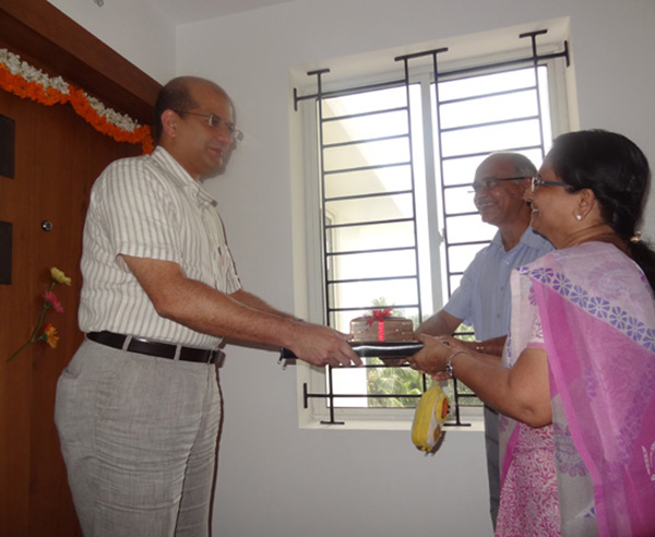 Keys being handed over to Mr & Mrs Nandakumar of apartment no. A 7 