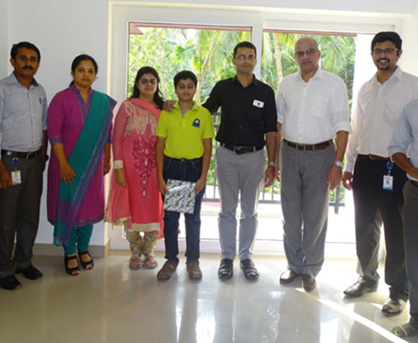 Our team with Mr. John Mathew & family of apartment B 1 in Crescent Aster after handing over.