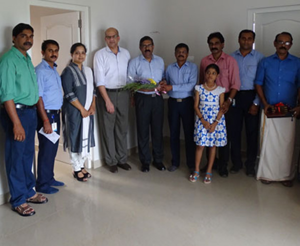 Our team with Mr. Muraleedharan & family of apartment C 8  in Crescent Aster after handing over 