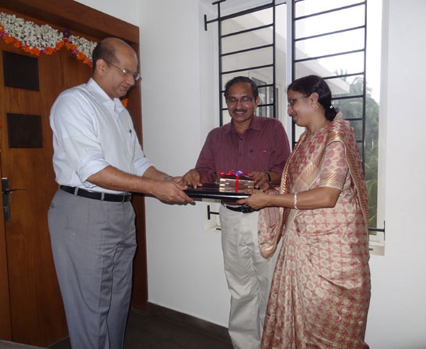 Keys being handed over to Mr.& Mrs. P.C.Basheer of apartment no. A 4 