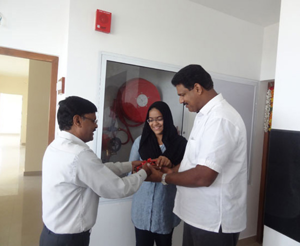 Keys being handed over to Mr. Abdu Rahiman of apartment C 11 