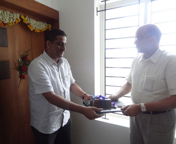 Keys being handed over to Mr.Azeem.V.P of apartment no. A 11