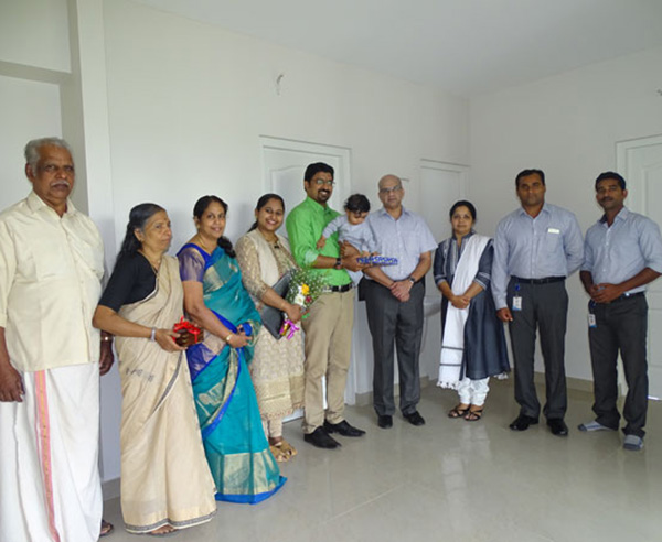 Our team with Dr. Renjith & family of apartment C 6 in Crescent Aster after handing over.