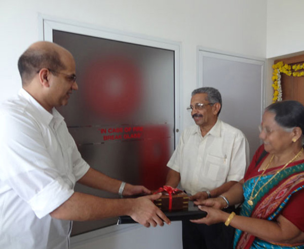 Keys being handed over to Mr. & Mrs. T Balakrishnan of apartment C 8