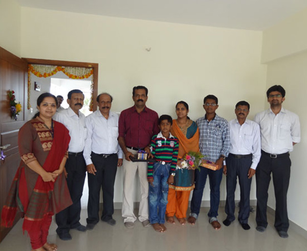 Mr. Rameshan & family, of apartment no C 5 in Crescent Mansa during handing over ceremony