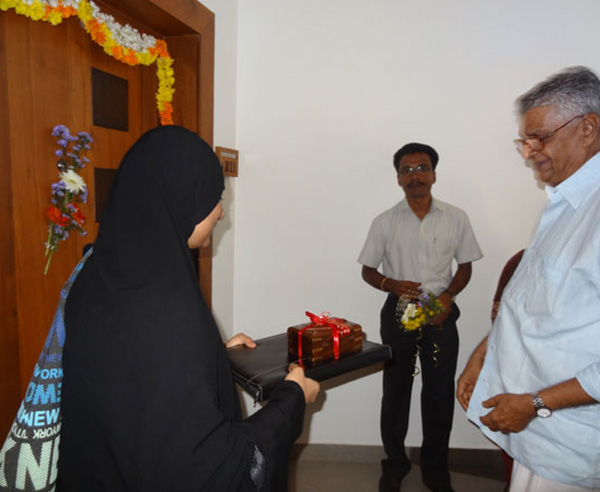 Keys being handed over to Mr.Anwar Hassan of apartment no. B 11 