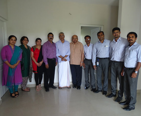 Our team with Mr. Sasikumar N  P & family of apartment C 4 in Crescent Aster after handing over.