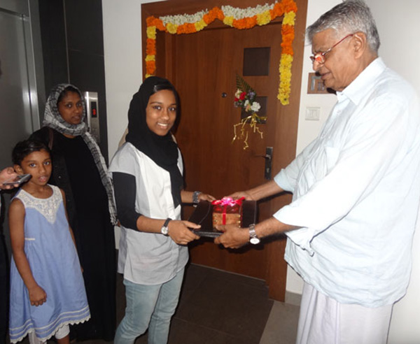 Keys being handed over to Mr. Muhamad Abdurahiman & Family