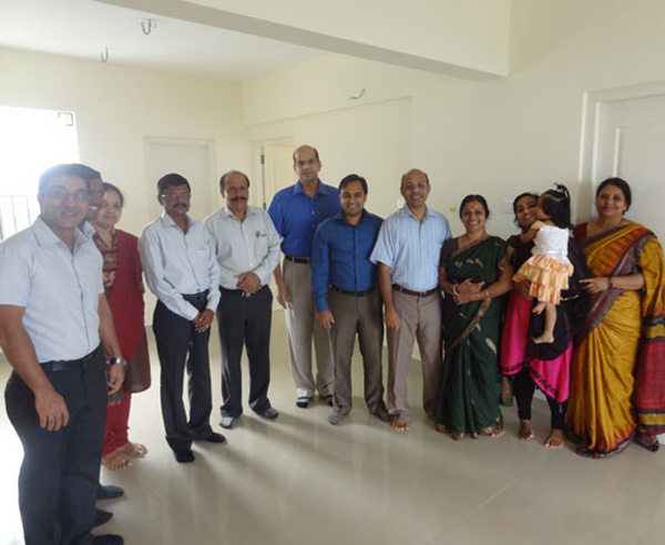 Mr. Ranjeev Rajan & family , of apartment no A 10 in Crescent Mansa during handing over ceremony