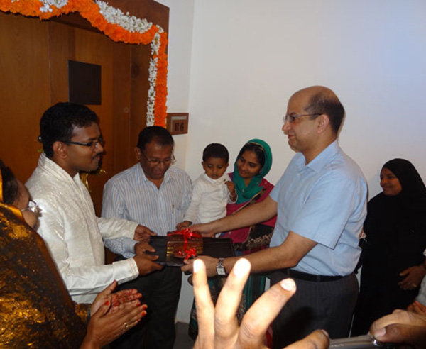 Keys being handed over to Mr. Mohammed Rassal & Family, apartment no. B 6