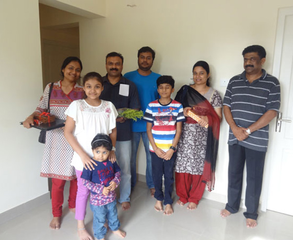 Ms. Janaitha and Mr.Anil Kumar & family , of apartment no B 2 in Crescent Mansa during handing over ceremony