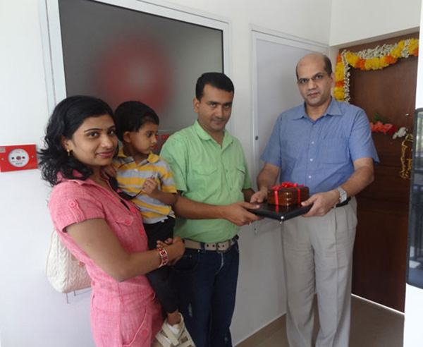 Keys being handed over to Mr. & Mrs. Susanth S of apartment no C 3