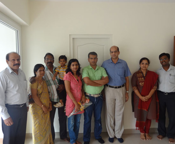 Mr. Susanth & family, of apartment no C 3 in Crescent Mansa during handing over ceremony