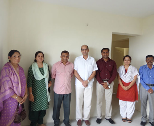 Mr. Jaleel & family , of apartment no B 10 in Crescent Mansa during handing over ceremony