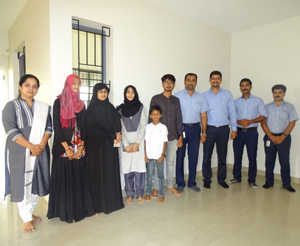 Our team with Ms. Ramla  & family of apartment A 7 in Crescent Aster after handing over