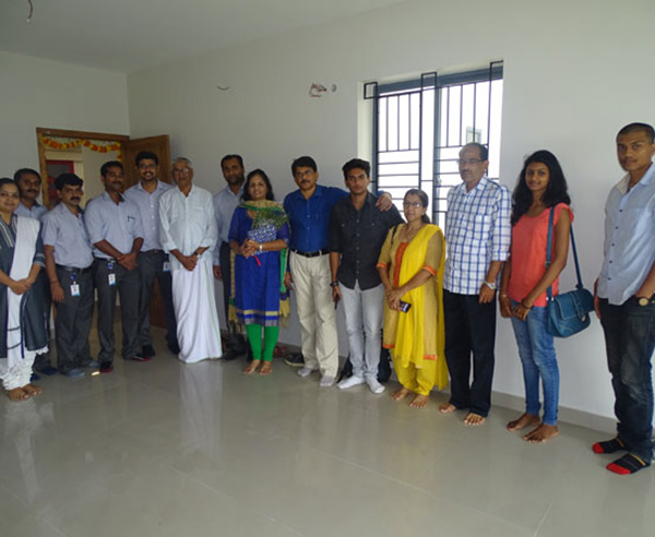 Our team with Mr. Renjith & family of apartment B 13 in Crescent Aster after handing over