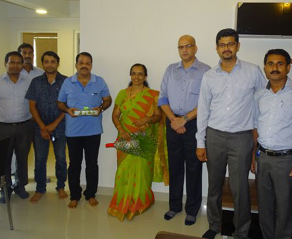 Our team with Ms. Sreelatha & family of apartment D 6 in Crescent Aster after handing over