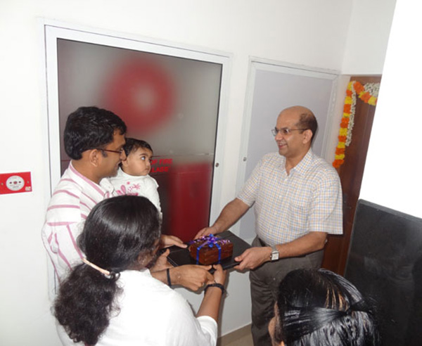 Keys being handed over to Mr. & Mrs. Ashiervad Sivadas of apartment no C 4