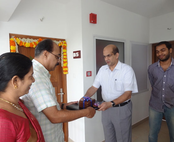 Keys being handed over to Mr. Abdul Jamal of apartment no B 5