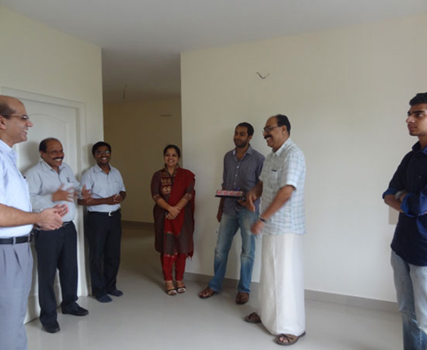 Mr. Jamal and family, of apartment no B 5 in Crescent Mansa during handing over ceremony