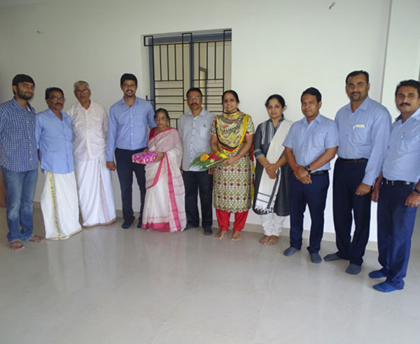 Our team with Mr. Viswanath & family of apartment B 4 in Crescent Aster after handing over