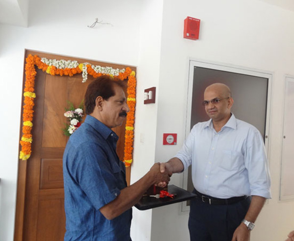 Keys being handed over to Mr. K Mohammed Kutty of apartment B 1