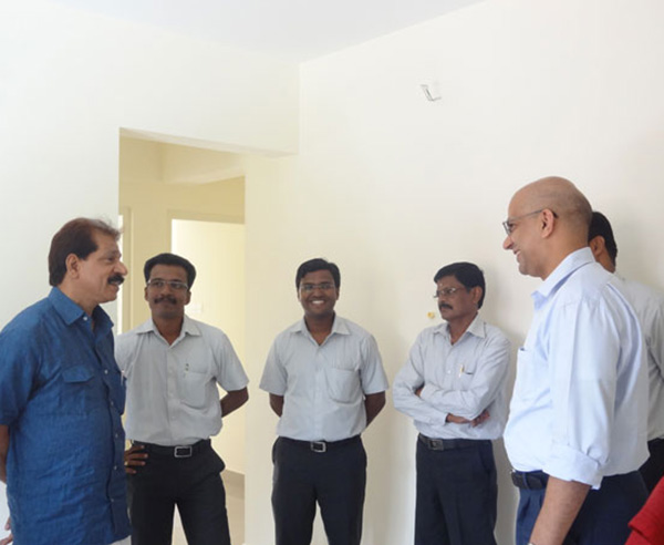 Mr. Mohamed Kutty, of apartment no B 1 in Crescent Mansa during handing over ceremony