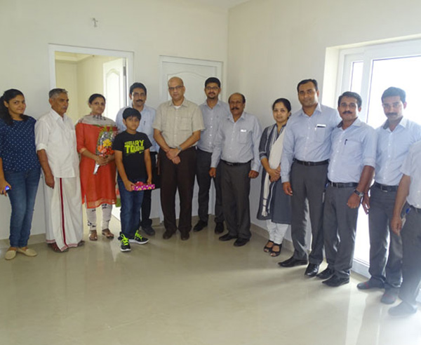 Our team with Mr. Deepak Kalathil & family of apartment C 12 in Crescent Aster after handing over