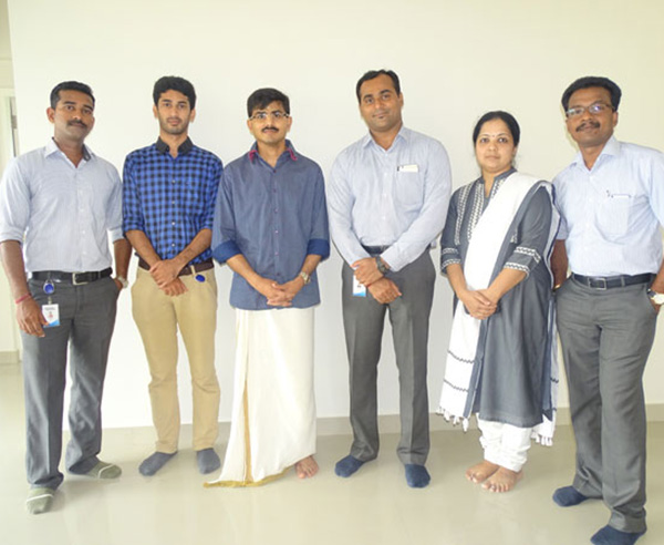 Our team with Mr. Balachandran of apartment D 5 in Crescent Aster after handing over