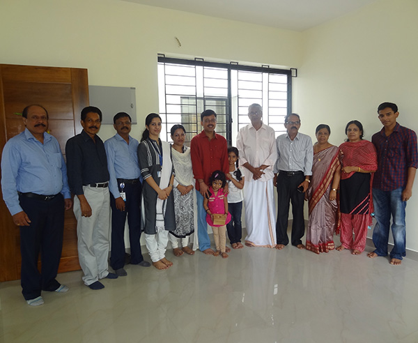 Dr.Binish Sreekumar & family, of apartment F 8 in Crescent Iris during handing over ceremony.