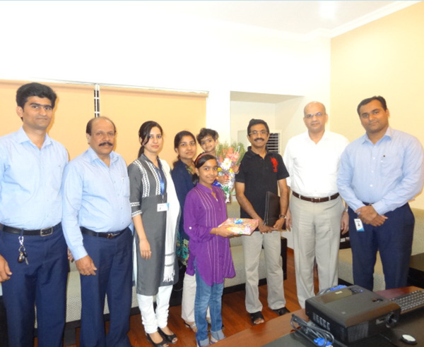 Mr.Anoop Kumar & family,of apartment D 8 in Crescent Iris during handing over ceremony.