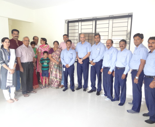 Lt.Col.Arun Menon & family, of apartment B 1 in Crescent Iris during handing over ceremony.