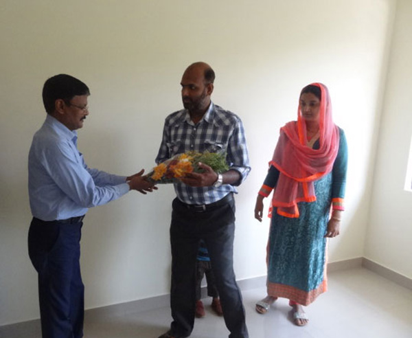 Our G M Projects greeting Mr.Jamaludheen of apartment D 4,Crescent Iris during handing over ceremony.