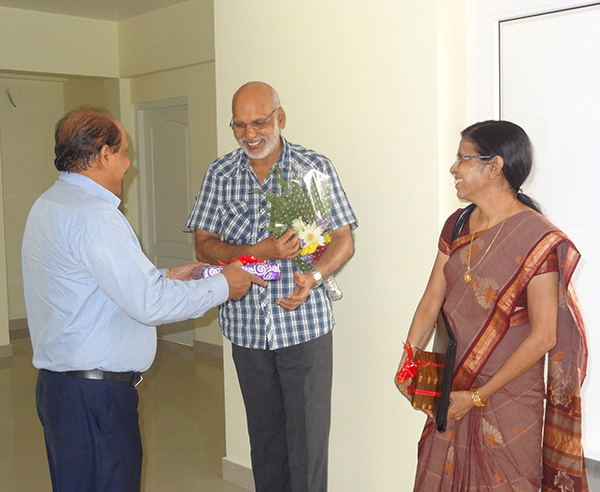 Our G M Administration greeting  Mr.Narayanan of apartment A 3,Crescent Iris during handing over ceremony.