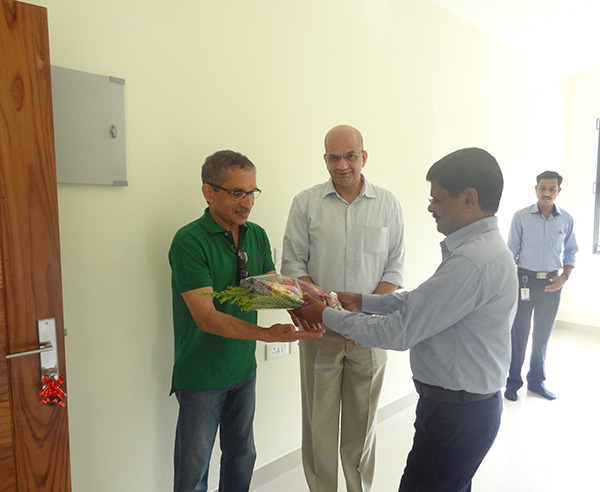 Our G M Projects greeting Mr.Nissar of apartment D 2, Crescent Iris during handing over ceremony.