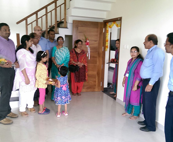 Dr.Krishnaprasad & family, of apartment E 8 in Crescent Iris during handing over ceremony.