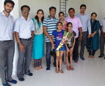 Our team with Mr. Prashanth and family of apartment B 6 in Crescent Tulip after handing over