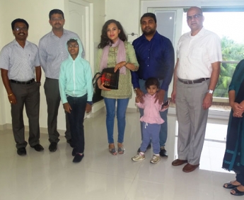 Our team with Mr. Mubash and family of apartment A 8 in Crescent Tulip after handing over