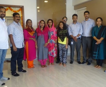 Our team with Dr. Faseela K M and family of apartment C 7 in Crescent Tulip after handing over