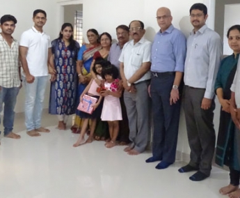 Our team with Dr. Jineesh Thottath and family of apartment C 8 in Crescent Tulip after handing over