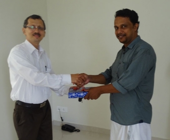 Our Site Engineer - Mansoor greeting Mr. Rajeendran of apartment F 11 in Crescent Tulip during handing over ceremony.