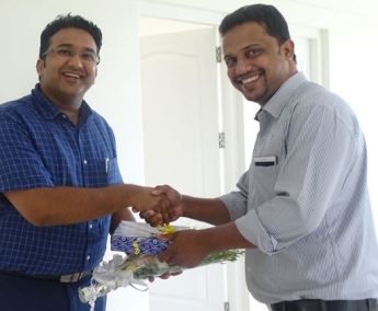 Our Site Engineer - Mansoor greeting Dr. Jishin Ahmed of apartment C 11 in Crescent Tulip during handing over ceremony.