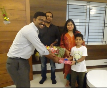 Our Project Engineer - Jijo greeting Master Ishaan Anu Bipin of apartment no.A 1 in Crescent Tulip during handing over ceremony.