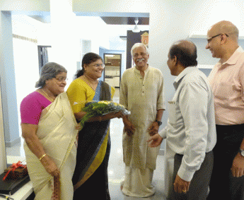 Our G M Administration - Rajan greeting Mr. M T Ramakrishnan & family of apartment no. H 9 & 10 in Crescent Zinnia during handing over ceremony.