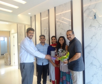 Our AGM Projects Jeswint Clement greeting Mr.Chembakam Veettil Praveen Kumar of apartment no. E 8 in Crescent Zinnia during handing over ceremony.
