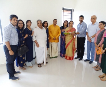 Our team with Ms.Bina Valsraj & Family of apartment no. I 11 in Crescent Zinnia after handing over.