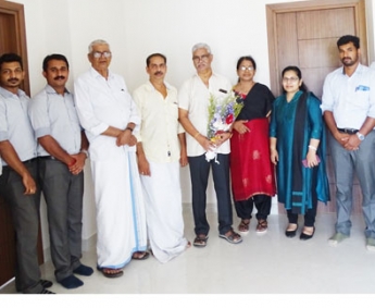 Our team with Dr. K C Narayanan & family of apartment no.C 04 in Crescent Lavender, after handing over	